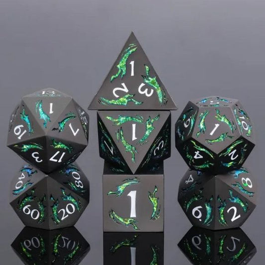 The perfect companion for your gaming needs! These premium die-cast polyhedral dice are exactly what you've been searching for that upcoming game night with the group. Each set weighs roughly 5 ounces and are stored in a quality, brushed metal tin with foam insert. These dice are engraved with crisp, easy-to-read numerals. Many styles and colors are available.

This set includes one of each: d20, d12, d10, d10 (percentile), d8, d6, and a d4 (7 dice in total). All inside a premium Dice Tin.