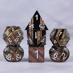 The perfect companion for your gaming needs! These premium die-cast polyhedral dice are exactly what you've been searching for that upcoming game night with the group. Each set weighs roughly 5 ounces and are stored in a quality, brushed metal tin with foam insert. These dice are engraved with crisp, easy-to-read numerals. Many styles and colors are available.

This set includes one of each: d20, d12, d10, d10 (percentile), d8, d6, and a d4 (7 dice in total). All inside a premium Dice Tin.