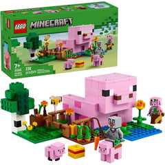 LEGO Minecraft The Baby Pig House (21268) building toy gives kids ages 7 and up the opportunity to recreate action from the popular video game. The toy figures & playset included in this building kit features five figures from the popular video game: a hero character in a wolf skin, a baby pig, bee, an adult pig and a zombified piglin. Kids can saddle up the adult pig or dangle a carrot in front of it to take a ride around the pig-shaped house and garden. Set in the Minecraft forest biome, there’s a farm pl