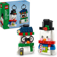 Let it snow, let it snow, let it snow! Make wishes of a white Christmas come true with this LEGO® Snowman Ornaments (40812) building set for kids aged 6 and up, which includes 2 adorable snowman figures.
Girls and boys will have lots of fun building the snowman toys and admiring all the cute details, including their charming carrot noses. There’s an adult snowman who wears a top hat and holds a gift and a child snowman who wears glasses and a beanie and holds a lantern. The snowmen figures also include hang