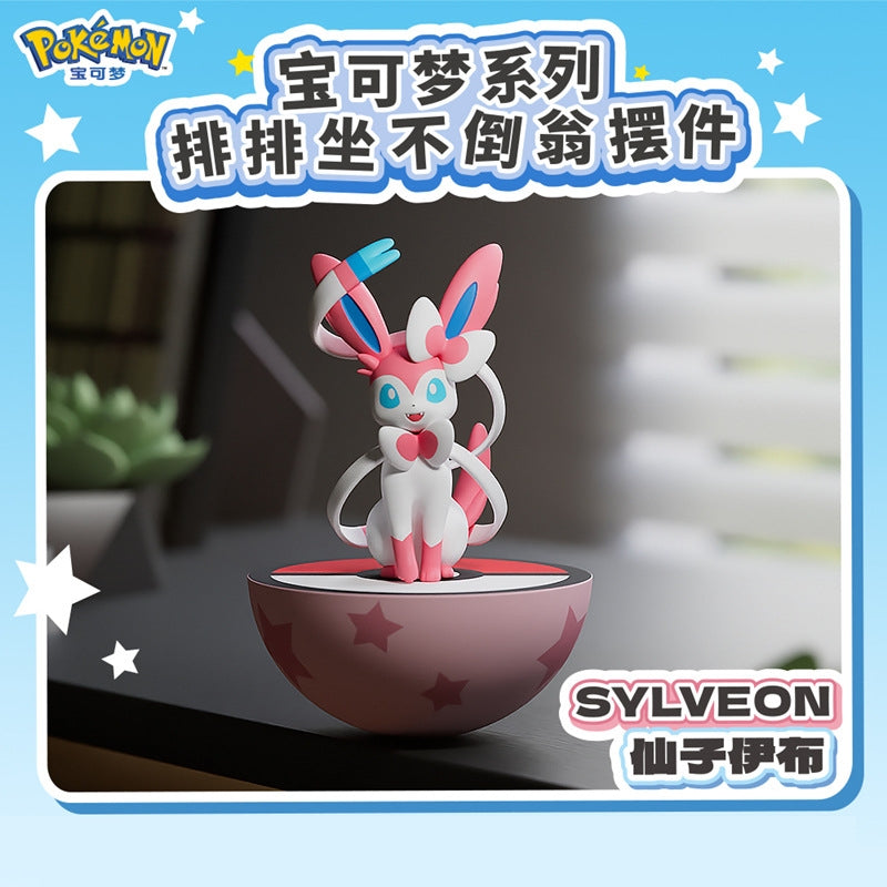 Add a touch of Fairy-type charm to your collection with this adorable Sylveon Wobble Balance Figure from Langbowang! Featuring the beloved Evolution Pokémon perched atop a colorful Poké Ball-inspired base, this collectible figure is designed with a self-righting wobble mechanism that gently rocks and returns upright when nudged.

With Sylveon's signature ribbons, bows, and pastel color palette faithfully recreated in a cute stylized design, this desktop collectible makes a delightful display piece for Pokém