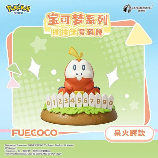 Bring some fiery fun to your collection with this adorable Fuecoco Number Plate Display Figure by Langbowang! Featuring the lovable Fire Croc Pokémon from the Paldea region, this charming collectible showcases Fuecoco sitting behind a white picket fence with interchangeable number pieces, creating a playful display that's both decorative and functional.

Fuecoco's cheerful expression, vibrant colors, and detailed sculpting perfectly capture the laid-back personality that fans know and love. Set atop a grass