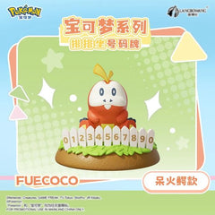 Bring some fiery fun to your collection with this adorable Fuecoco Number Plate Display Figure by Langbowang! Featuring the lovable Fire Croc Pokémon from the Paldea region, this charming collectible showcases Fuecoco sitting behind a white picket fence with interchangeable number pieces, creating a playful display that's both decorative and functional.

Fuecoco's cheerful expression, vibrant colors, and detailed sculpting perfectly capture the laid-back personality that fans know and love. Set atop a grass