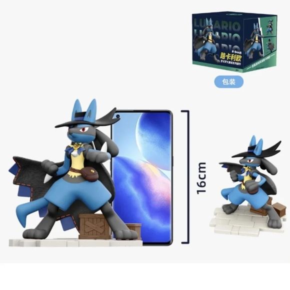 Step into the world of Pokémon Unite with this premium Pokemon Unite Clothed Figure Series PVC Statue - Lucario. Inspired by Lucario's fashionable Holowear appearance, this highly detailed collectible features the Aura Pokémon dressed in a sophisticated wide-brim hat, flowing cape, satchel, and decorative accessories that capture the stylish spirit of Pokémon Unite.

Standing approximately 6.3 inches (16 cm) tall, this display-quality figure showcases Lucario in a confident action pose atop a themed display