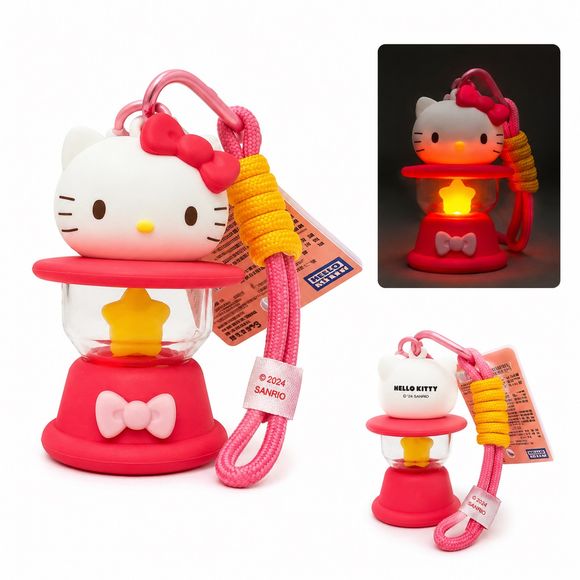 Take Hello Kitty with you wherever you go with this adorable light-up lantern keychain! Featuring Hello Kitty perched atop a charming lantern design with a glowing star-shaped light inside, this cute accessory adds a touch of Sanrio magic to backpacks, purses, keys, and more.

Press the button to illuminate the lantern and create a warm glow that's perfect for displaying your favorite character in style. Complete with a sturdy clip and colorful carrying cord, this collectible keychain is both fun and functi
