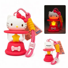 Take Hello Kitty with you wherever you go with this adorable light-up lantern keychain! Featuring Hello Kitty perched atop a charming lantern design with a glowing star-shaped light inside, this cute accessory adds a touch of Sanrio magic to backpacks, purses, keys, and more.

Press the button to illuminate the lantern and create a warm glow that's perfect for displaying your favorite character in style. Complete with a sturdy clip and colorful carrying cord, this collectible keychain is both fun and functi