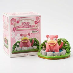 Relax and unwind with this adorable Slowpoke figure from the Pokémon Nature Adventure Series. Featuring Slowpoke happily lounging among decorative stones and flowering greenery, this collectible captures the laid-back personality that has made the beloved Water- and Psychic-type Pokémon a fan favorite for generations.

Designed with soft colors, charming details, and a scenic nature-themed display base, this figure brings a peaceful atmosphere to any Pokémon collection. Whether displayed on a desk, shelf, o