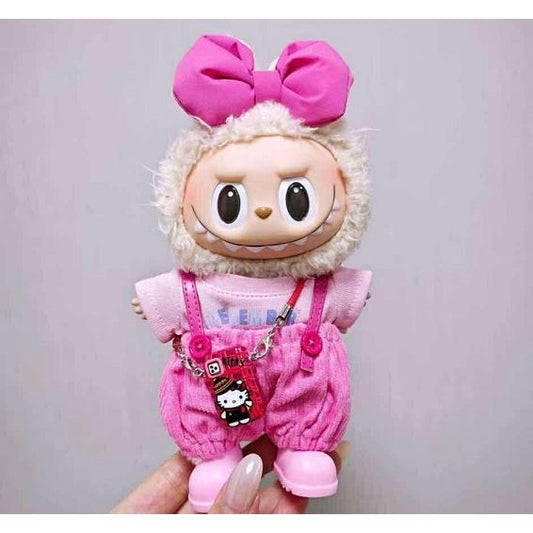 Hello Kitty Super Fan Outfit is here! Outfit includes shoes, overalls, blouse, phone, and bow for your favorite Labubu. Customize and accessorize yours today! Labubu not included.