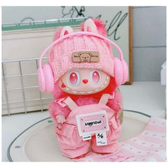 Outfit includes wool cap, headphones, and overalls for your favorite Labubu. Customize and accessorize yours today! Labubu not included.