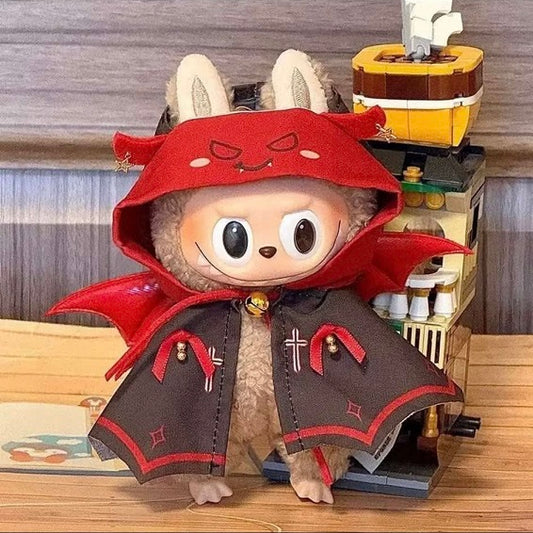 Enter the Castle of Count Labubula, if you dare. Tricks and treats abound, so beware! This ghoulish outfit includes a vampire cloak and hood perfect for all of your vampirism needs for your favorite Labubu. Customize and accessorize yours today! Labubu not included.