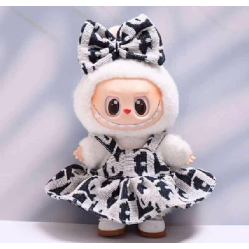 Outfit includes a dress and bow perfectly designed to fit your favorite Labubu. Modeled after our previous best selling Black & White Box. This version is a slightly more beige version. Customize and accessorize yours today! Labubu not included.