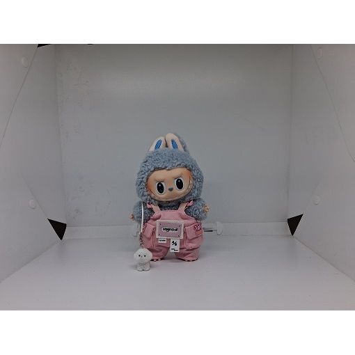 Includes an adorable puppy accessory and pink overalls for your favorite Labubu. Customize and accessorize yours today! Labubu not included.
