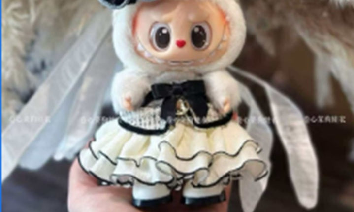 Outfit includes an elegant party dress for your favorite Labubu. Customize and accessorize yours today! Labubu and hat not included.