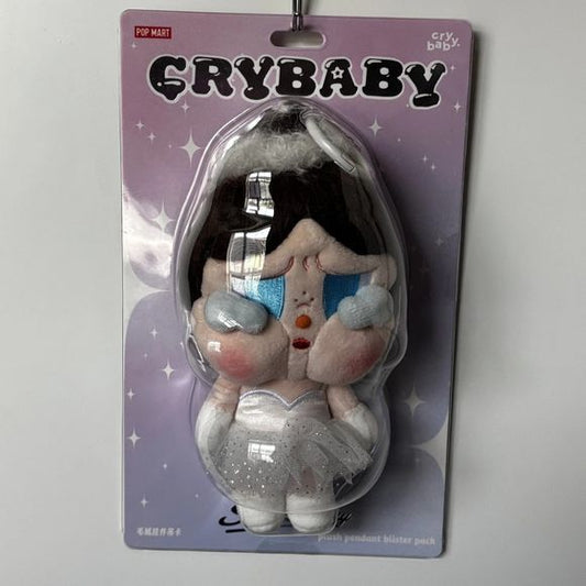 Shine brighter wherever you go with Pop Mart’s CRYBABY SHINY SHINY Series – Plush Pendant (Blister Pack). Released on July 24, 2025, these petite plush pendants measure approximately 17 cm × 8.5 cm × 6 cm and are wrapped in soft polyester for a luxurious touch. Each pendant shimmers with a dazzling “Shiny Shiny” finish—ready to turn heads as a collectible charm or keychain accessory. Sold in individual blister packs.