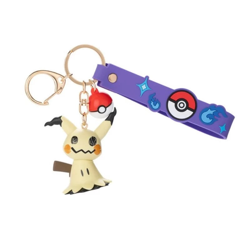 Add a little mystery to your everyday adventures with the Funism Pokémon Mimikyu Vinyl Keychain! This officially licensed accessory features Mimikyu as a detailed vinyl charm, accompanied by a Poké Ball accent and a colorful Pokémon-themed wrist strap. The keychain includes multiple attachments, making it easy to clip onto keys, backpacks, bags, or other accessories. A fun collectible for Pokémon fans and anyone who loves the adorably spooky Mimikyu!

Size: 7–10 cm (2.75-3.93-inches)