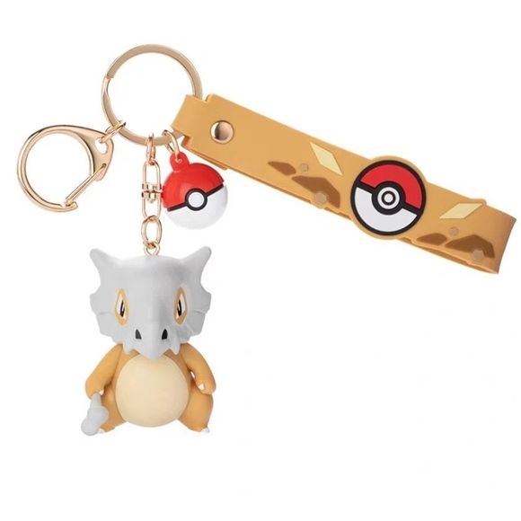 Inspired by the adorable Ground-type Pokémon from the Kanto region, this item features a vivid design and vibrant colors—perfect for decorating your backpack, handbag, or keys.

Size: 7–10 cm (2.75-3.93-inches)