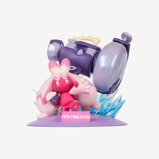 Add the mischievous power of Tinkaton to your collection with the Funism Twinkmont Pokémon Tinkaton Prime Figure! This premium mini PVC statue captures Tinkaton in a dynamic battle-ready pose, complete with its signature oversized hammer and striking translucent blue energy effects. Standing approximately 4 inches tall, this officially licensed Pokémon collectible features exceptional sculpting, vibrant colors, and display-worthy detail that brings the fan-favorite Fairy/Steel-type Pokémon to life.

Part of