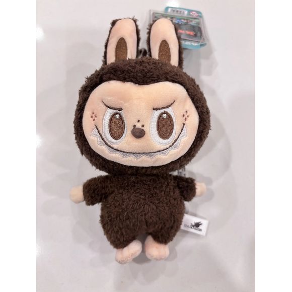 This exclusive plush pendant showcases Labubu in a soft, high-quality plush design with a convenient keychain/bag attachment, making it perfect for decorating backpacks, purses, tote bags, or keys. Whether you're a long-time collector or just discovering the charm of Labubu, this POP LAND exclusive release is a must-have addition to any designer toy lineup.  Authentic.