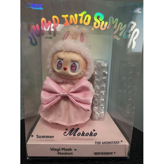 Embrace the warmth of summer with the Pop Mart Mokoko Jump Into Summer Vinyl Plush Pendant. This delightful accessory features Mokoko, the beloved character from Pop Mart's "The Monsters" series, dressed in a charming bunny-themed outfit. With its soft pink hues and playful design, this pendant captures the essence of sunny days and playful adventures.  Approximately 18cm in height.  Authentic.