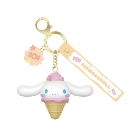 Sweeten your day with the Langbowang Holly Box Sanrio Characters Snack Charm Vinyl Keychain - Cinnamoroll! This adorable collectible features Cinnamoroll transformed into a delightful ice cream cone treat, complete with pastel pink swirls and charming dessert-inspired details that perfectly capture the whimsical style of the Snack Charm Series.

Finished in soft pastel colors, this keychain includes a matching Cinnamoroll logo strap and a decorative candy charm accent for an extra touch of sweetness. The de