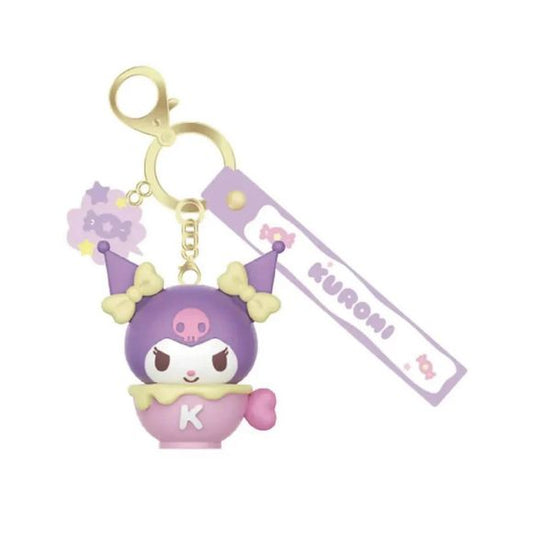 Treat yourself to a little Sanrio sweetness with the Langbowang Holly Box Sanrio Characters Snack Charm Vinyl Keychain - Kuromi! This adorable collectible features Kuromi peeking out from a pastel dessert cup decorated with her signature "K," combining her mischievous personality with a cute café-inspired design.

Finished in soft purple and pink tones, the keychain includes a matching Kuromi wrist strap and a decorative candy charm accent for an extra touch of sweetness. The detailed vinyl sculpt and durab
