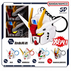 Bring your favorite Mobile Suits everywhere with these SD Gundam Light-Up Head Keychains! Featuring detailed SD-style Gundam head sculpts with bright LED light-up eyes and head sensors, these collectible keychains are perfect for backpacks, keys, display, or everyday carry. Their larger size and high level of detail make them stand out from standard capsule keychains while still remaining lightweight and portable.

Each blind box includes 1 randomly selected Gundam design.
