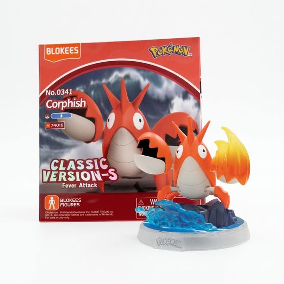 <p>Add the tough and energetic Water-type Pokémon <strong>Corphish</strong> to your collection with the <strong>Blokees Pokémon Classic Version-S Corphish Fever Attack Figure</strong>!</p>

<p>This officially licensed Pokémon collectible recreates Corphish in Blokees' stylized figure format, featuring its bright red shell, oversized claws, and distinctive wide-eyed expression.</p>

<p>Part of the <strong>Classic Version-S Fever Attack</strong> series, Corphish comes with a themed scenic base and translucent