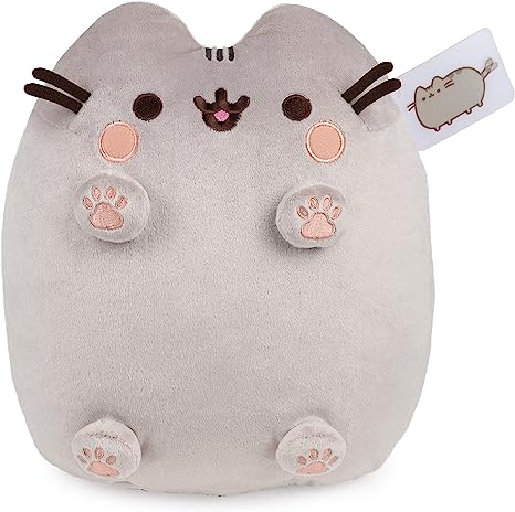 Pusheen has the cutest little toe beans around! This soft, squeezable 11” plush features Pusheen in an upright sitting pose as she shows off her best feature: those irresistibly cute paws embroidered with pink toe beans. Pusheen’s soft gray plush is accented by rosy pink embroidered cheeks and her signature smile, making it the perfect gift for any fan of the lazy, tubby tabby.
Each Pusheen plush is designed with premium soft, surface-washable plush and ships in a protective poly bag. Appropriate for ages 8