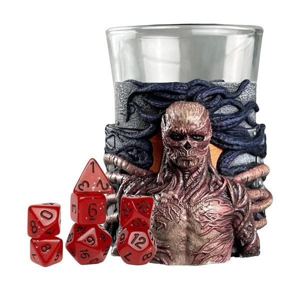 Bring the Upside Down to your gaming table with Stranger Things Mini Dice Cups- a must-have for RPG fans and Stranger Things collectors alike. Made from glass and featuring detailed sculpts of iconic creatures and themes from the hit Netflix series, these mini dice cups combine style, function, and fandom. Each cup comes paired with a complete 8-piece mini polyhedral dice set, perfect for your favorite tabletop RPG. Inside, you'll find:d4 x 1d6 x 1d8 x 1d10 x 1d12 x 1d% x 1d20 x 2Choose from four collectibl