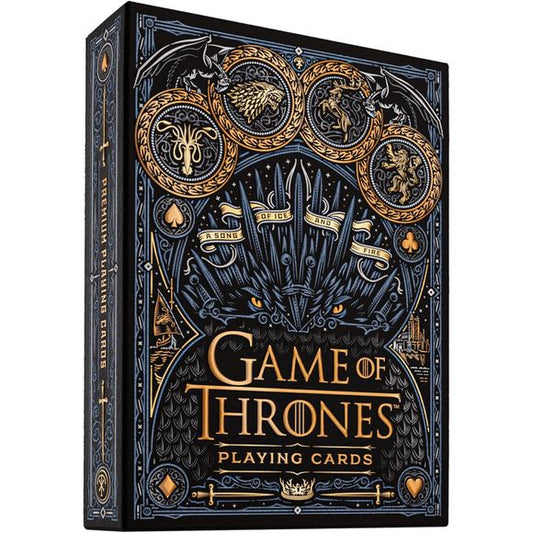 THE IRON THRONE: Are you worthy? Premium playing cards inspired by the legendary HBO television series.
WIN OR DIE: Featuring a lavish blend of bronze, gold, ice blue, and iron foil details, along with premium textured embossing, it’s like each deck sings a song of ice and fire. Take a journey through Westeros and the Seven Kingdoms!
WINTER IS COMING: Forge your path through Westeros with Jon Snow, Daenerys Targaryen, Arya and Sansa Stark, Cersei and Jamie Lannister, The Night King, and all of your favorite