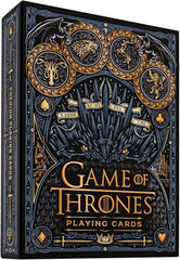 THE IRON THRONE: Are you worthy? Premium playing cards inspired by the legendary HBO television series.
WIN OR DIE: Featuring a lavish blend of bronze, gold, ice blue, and iron foil details, along with premium textured embossing, it’s like each deck sings a song of ice and fire. Take a journey through Westeros and the Seven Kingdoms!
WINTER IS COMING: Forge your path through Westeros with Jon Snow, Daenerys Targaryen, Arya and Sansa Stark, Cersei and Jamie Lannister, The Night King, and all of your favorite