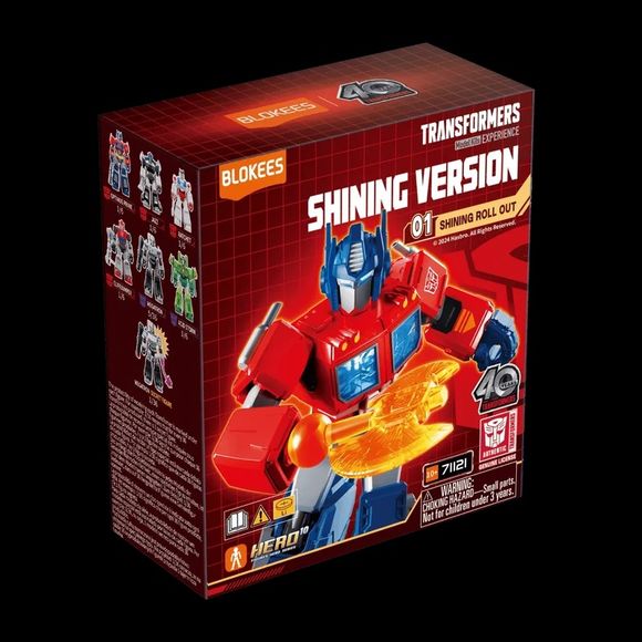 <p>Roll out into battle with the <strong>Blokees Transformers Shining Version 01 – Shining Roll Out Blind Box</strong>! This officially licensed collectible series features six iconic Autobots and Decepticons, including Optimus Prime, Jazz, Ratchet, Cliffjumper, Megatron, and Acid Storm, plus a rare special Megatron chase variant. Each mystery box contains one randomly selected model kit featuring over 20 points of articulation, detailed paintwork, and exciting luminous effects. Every figure includes charac