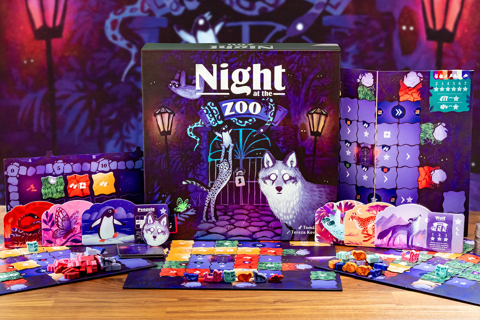 The animals are out! Sneaking out of the zoo at night for a little break, they need your help to find their way back before the keepers discover their absence.

In this tile-drafting game, the players must safely guide the animals back to their enclosures. They will explore the darkened zoo, discovering the best routes home.

Each round, you'll draft tiles and strategically place them on your board. This action not only builds a path for your animals but also triggers special abilities. With each animal hav