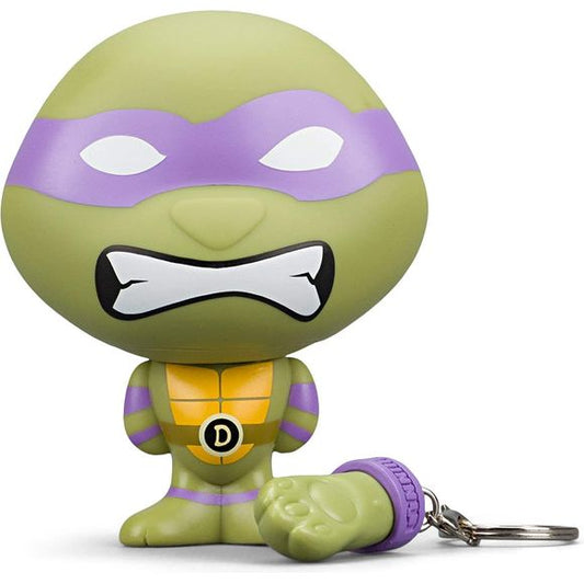 Introducing the TMNT Donatello BHUNNY 4" Vinyl Figure featuring one of your favorite turtles in a half shell. Kidrobot brings to life number 4 in the new series of BHUNNY vinyl figures with one of the Teenage Mutant Ninja Turtles... Donatello. Packaged in a collectible window box for display and collectible coordinating lucky BHUNNY PAW keychain, this Donatello toy figure is limited so once it's gone... it's gone! BHUNNY by Kidrobot brings the iconic collectible vinyl format to a new level: striking designs