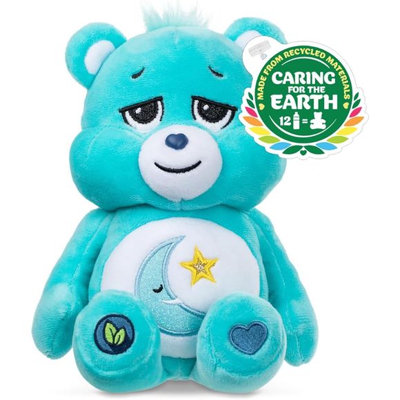 The Care Bears are here to make sharing and caring even more magical with their fun, sparkly design with the Care Bears Fun Size Sparkle Plushies, Series 5! Meet Bedtime Bear Sparkle Plush, the snuggly friend who helps everyone drift off to dreamland with a heart full of sleepy magic. This cozy 9-inch plush is just the right size for little ones and collectors, with a glittery belly badge featuring a sleepy-faced moon and twinkling yellow star—perfect for bedtime routines and sweet dreams. Made with soft, s