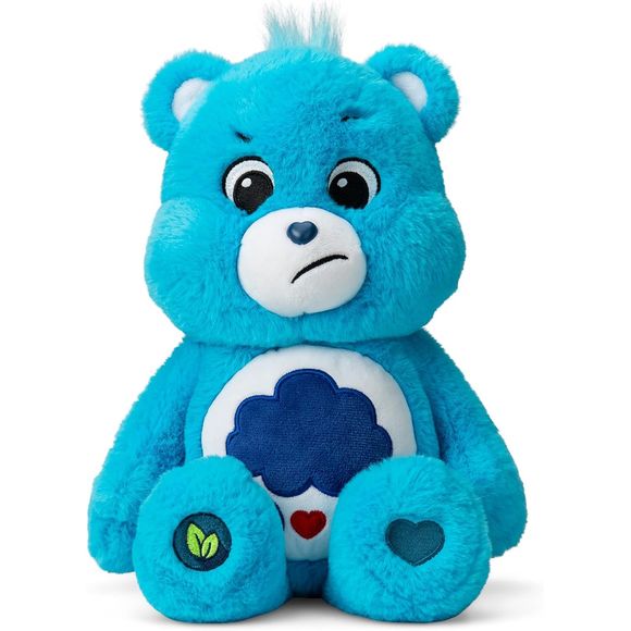 The Care Bears are a group of lovable, huggable BFFs who are all about spreading good caring vibes across the world. As part of their mission of sharing and caring, they want to ensure that we are keeping our earth clean for generations to come by embracing a message of "cleaner and greener is the way to grow!" To champion their message of environmental responsibility, 14" Grumpy Bear plushie has become one of the newest besties to "go green!" Made from sustainable materials, 14" Grumpy Bear has been design