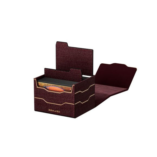The DOMARU Armory Collection is our latest deck box line, built for strength, durability, and a commanding presence at the table. Featuring refined metallic details, a rugged textured exterior, and strong magnetic closures, each Armory box delivers uncompromising protection for serious play. Side Loading. Fits 100 double-sleeved cards. Includes 2 leather dividers. Strong Magnets. Sturdy textured leather materials and metallic details.